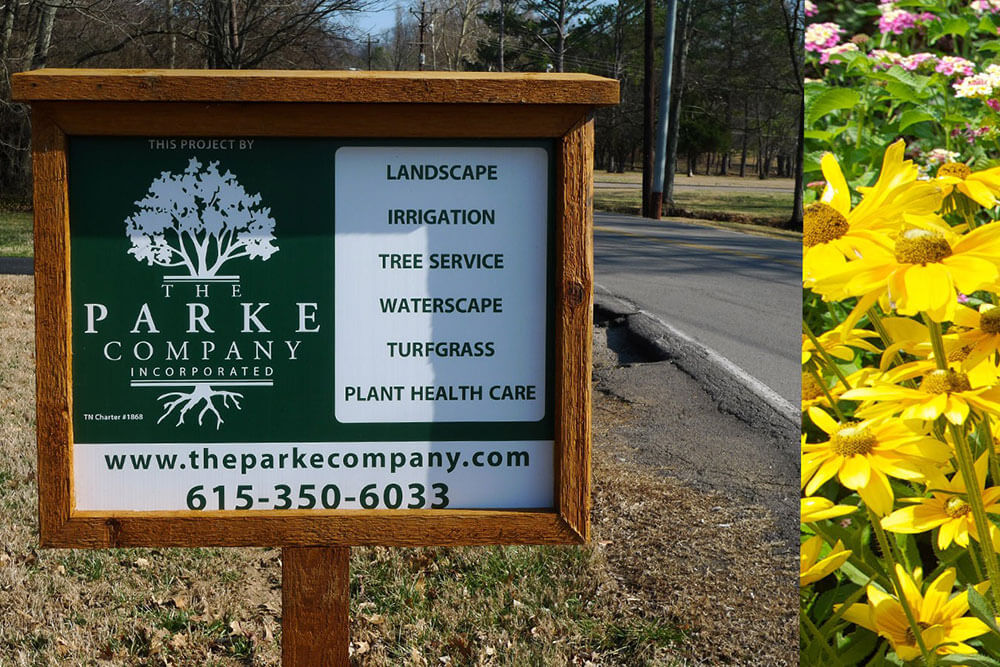 The Parke Company landscaping sign with services listed