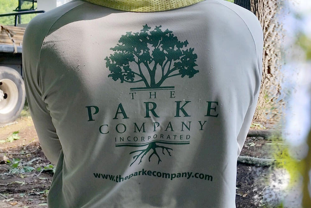 The Parke Company landscaper with a logo shirt on