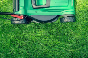 Lawnmower mowing a lawn