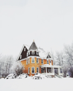 House freshly coated in snow