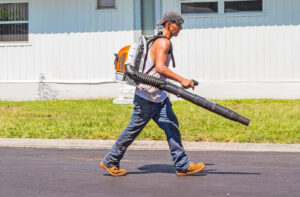 The Parke Company landscaper leaf blowing